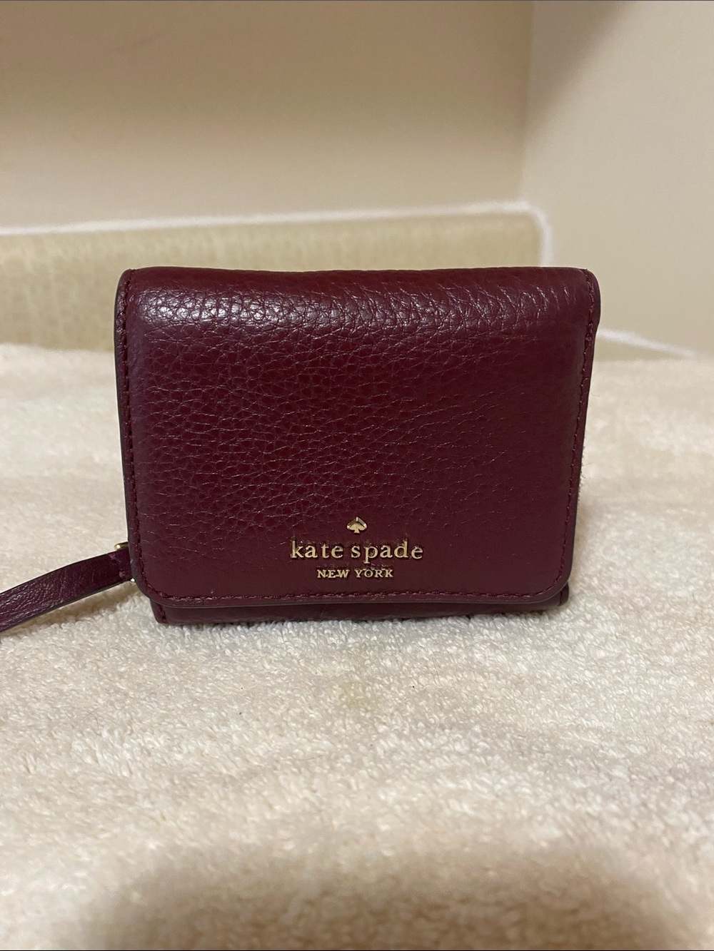kate spade Burgundy Leather Compact Wallet with Gold Logo